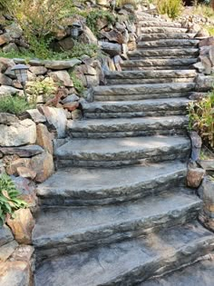 stone steps leading up to the top of a hill