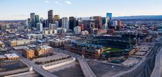 an aerial view of a city with lots of tall buildings