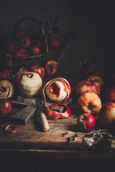 apples and other fruit on a wooden table