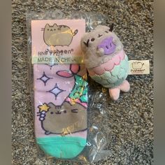 Great Gift Idea To Yourself Or Someone You Love Includes Unopened Pusheen Purrmaid Socks And Plush Keychain On Ball Chain. Some Tags That Represent What You Can Find In My Closet: Tags Dopamine Dressing, Anthropologie, Free People, Vintage, Handmade, Handcrafted, Boho, Bohemian, Cottagecore, Mermaidcore, Fairycore, Girlhoodcore, Ooak, Coquette Girl, Mental Health, Self Care, Fable, Dainty, Custom, Customizable, Floral, Romantic, Lace, Velvet, Victorian, Edwardian, Magnolia Pearl, Coastal, Mounta Pusheen Jewelry, Pusheen Gifts, Pusheen Stuffed Animal, Pusheen Keychain, Pusheen Collection, Pusheen Plush Keychain, Magnolia Pearl, Johnny Was, Pusheen