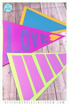 three pieces of paper with the word love cut out on them, sitting next to each other