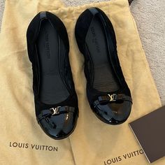 Black Flat Lv Ballerina Shoes, Signs Of Use, The Gold Lv Metallic Logo Is Detached In One Of Them, The Right Pair Has No Scratches Or Damage, Left Has 3 Unnoticeable Small Scratches Luxury Slip-on Flats With Removable Insole, Louis Vuitton Shoes Women Flats, Flat Ballerina Shoes, Shoes Signs, Luxury Black Slip-on Flats, Louis Vuitton Flats, Gold Leather Slip-on Flats, Shoes Louis Vuitton, Ballerina Shoes Flats