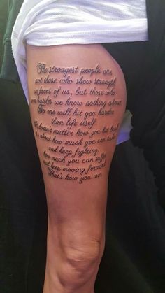 a woman's leg with a poem written on it