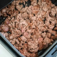 a close up of food in a pan on a table