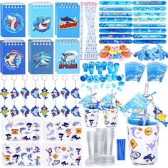 a birthday party with shark theme and decorations, including cupcake toppers, napkins, cups, markers, pens, tags, and more