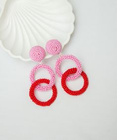 Pink and Red Hoop earrings. Ideal for evening and daily look. Round dangles earrings made of high-quality beaded and rings. CUSTOM ORDER It is Fully HANDMADE earrings and if you want to purchase this earring in a different color or size, send me please a direct message. If you have any questions don't hesitate to ask me. Please visit my shop to see more models made by me https://www.etsy.com/shop/LaranBijou DIMENSIONS Length - 8cm (3inch) Weight 15 grams Clip-On earrings Stud earrings SHIPPING I Trendy Red Circular Jewelry, Pink Dangle Hoop Earrings For Summer, Gift Hoop Beaded Earrings, Red Single Hoop Earring For Party, Summer Pink Dangle Hoop Earrings, Valentine's Day Beaded Earrings For Pierced Ears, Colorful Beads Hoop Earrings For Party, Pink Hoop Jewelry For Summer, Pink Beaded Earrings For Summer