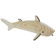 a wooden toy shark on a white background