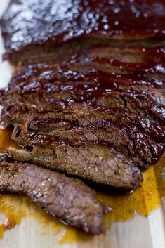 the steak has been sliced and is ready to be served on the table for consumption