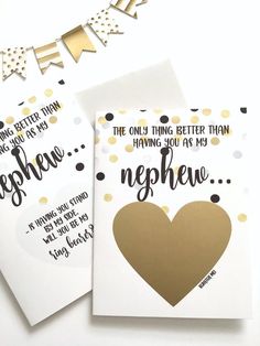 two greeting cards with gold foil on them, one has a heart and the other has a