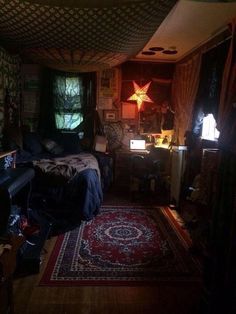 a bed room with a neatly made bed and a star on the wall above it