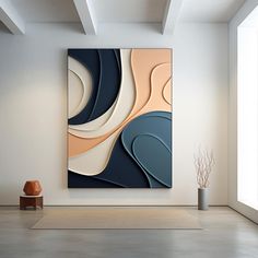 an abstract painting hangs on the wall next to a vase and chair in a white room