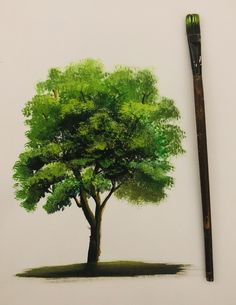 a drawing of a tree with a brush next to it