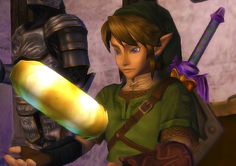 the legend of zelda is holding an object in his hand