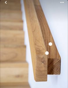 a close up of a wooden stair rail