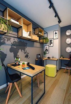 an office with desks, chairs and a world map on the wall