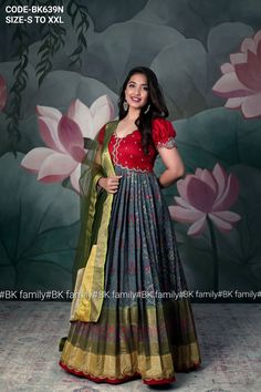 This Path Gamini Patola Waving Grey Anarkali celebrates artistic excellence and contemporary style with its contrast handworked yoke and designer puff sleeves. It's not just an outfit; it's a work of art that invites you to embrace the beauty of the past while stepping boldly into the future of fashion.🔹Code- BK639N🔹Name- Path Gamini Anarkali Dress🔹Size- S to XXL🔹Dress Fabric- Banarsi silk🔹Dress length- 55inches🔹Color- Grey and pink Sleeves For Gowns Indian, Silk Saree Frock Dresses, Pink Pattu Saree Contrast Blouse, Pattu Anarkali Dress, Paithani Kurti, Long Frocks Ideas, Long Dresses Indian Style, Long Gown Dress From Saree, Pattu Gown