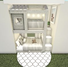 a room with a bed, couch and other items in it on the floor next to a rug