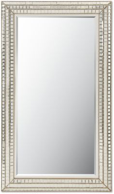 a mirror that is sitting on top of a table with a white border around it