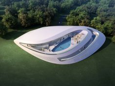 an aerial view of a futuristic swimming pool