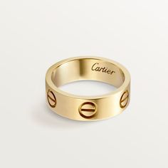 Cartier - LOVE ring - Ring Gold - LOVE ring, yellow gold (750/1000). Width: 5.5 mm (for size 52). Please note that the carat weight, number of stones and product dimensions will vary based on the size of the creation you order. For detailed information please contact us.