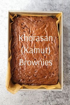 a brownie in a box with the words korasan, kamuh, brownies written on it