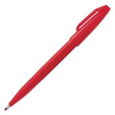 a red ballpoint pen sitting on top of a white surface