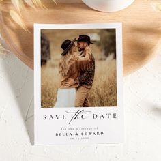 a save the date card with an image of a couple in a hat and dress