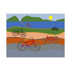 three bicycles on the beach with mountains in the background