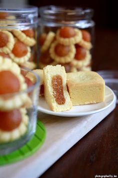 small desserts in glass containers on a table