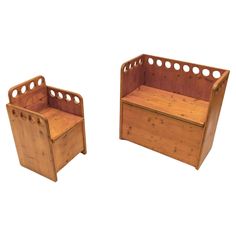 two wooden benches sitting next to each other on top of a white surface with holes in them