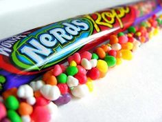 a candy bar with lots of colorful candies on it's wrapper,