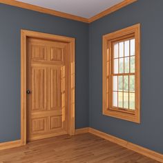 an empty room with blue walls and wooden doors