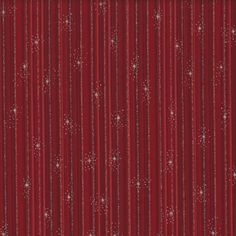 a red background with white snowflakes and stars on the bottom half of it