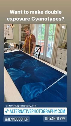 a man that is standing in front of a large blue table with water on it