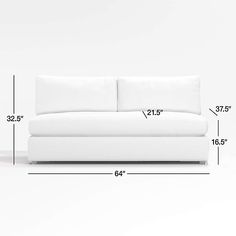 a white couch is shown with measurements for it