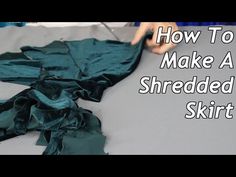 how to make a shredded shirt with scissors and fabric on the table top