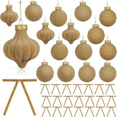 a bunch of wooden ornaments hanging from strings