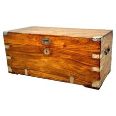 an old wooden chest with metal handles