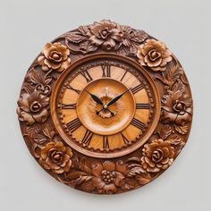 an ornate wooden clock with flowers and leaves on the face is shown in this image