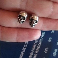 Silver Skull stud earrings: Antique - rustic metallic silver tone skull earrings for women and men. These eye-catching, cool, and comfy skull earrings with fine detail design are a great gift idea for any person who likes rock music or identifies with Gothic-Punk-Tattos fashion. Take them anywhere. Ready-to-Go! These earrings are also an elegantly casual jewelry accessory to be used in any event or party related to Day of the Dead or Halloween celebration. Not forgetting to also mention the skull jewelry collectors ☠ Apart from me, I know there are many others out there! Anyone who receives or wears them is going to be delighted. These earrings are a useful and distinctive gift that will be used and appreciated. Specifications: Material: Alloy Brass Metal Type: Women Jewelry Color: Antique Oc Sketchbook, Frida Kahlo Earrings, Detail Design, Mexican Jewelry, Music Jewelry, Earrings Antique, Casual Jewelry, Skull Jewelry, Gothic Punk