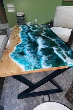 a table that has been made to look like an ocean wave on top of it