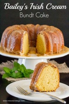 a bundt cake on a white plate with a slice taken out and the rest of the bundt cake in the background