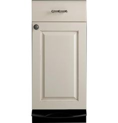 a white cabinet with a black base and knobs on the front door is shown