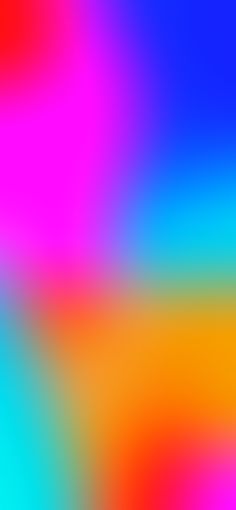 a blurry background with different colors and shapes