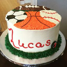 a decorated cake with the word lucas on it