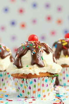 cupcakes with chocolate frosting and sprinkles on top