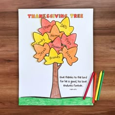 a handmade thanksgiving tree card with colored pencils