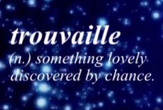 the words trouvalle are written in white on a blue background with stars