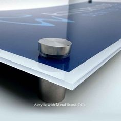 a close up view of a table with a metal object on it's surface