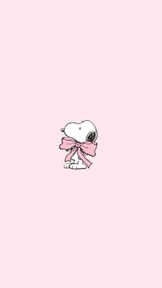 a pink wallpaper with a cartoon character wearing a bow on it's head